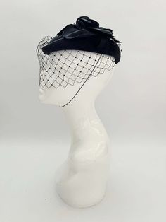 "Classic vintage hat. Perfect for Ascot, weddings, special occasions, very elegant. Comes with elastic to hold hat in place. Condition: vintage perfect Colour: black Label: Made in England Material: polyester Size: M inner circumference aprox. 21.5-22 inches, circumference 44\"\" *Please note all hats come securely packed in a box *All our vintage items come in clean and best condition possible *Please note all hats come securely packed in a box *All our vintage items are top quality authentic v Evening Pinched Crown Headpiece For Kentucky Derby, Black Structured Crown Headpiece For Weddings, Evening Headpiece With Pinched Crown For Kentucky Derby, Structured Crown Black Headpiece For Wedding, Black Cloche Fascinator For Races, Black Hat-style Headpieces For Wedding, Black Mini Hat For Kentucky Derby Wedding, Black Hat Headpiece For Wedding, Black Cloche Party Hat