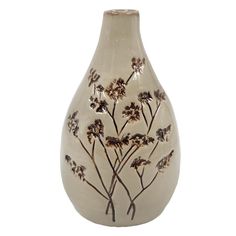 a white vase with flowers painted on it's side and brown stems in the middle