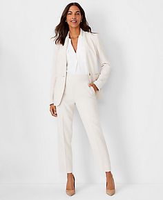 Impeccably tailored in refined crepe, our long collarless blazer is an endlessly versatile topper. V-neck. Long button-open sleeves allow for versatility in styling. One-button front. Front besom pockets. Back vent.,Bullet3:27" long,Hit:Hits at hip,Imported:Imported,Fit:Tailored fit,Fabrication:95% Polyester, 5% Spandex,Garment Care:Machine Washable The Long Collarless Blazer in Fluid Crepe by Ann Taylor Size regular - 00 Ivory Whisper Women's Blazers, Long, Sleeve, Suit, Jackets, Jackets, 95%, Winter White Suits For Women, Cute Business Attire For Women, Collarless Blazer Women, Tailored Jackets For Women, Women’s Pant Suits, Women’s Business Wear, Formal Suits For Women Business Professional, White Blazer Work Outfit, Women’s Wedding Suit