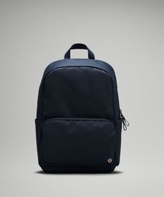 Simplicity At It’S Finest. The Everywhere Backpack Is A Fresh Take On A Classic. Featuring An Internal Padded 16” Laptop Sleeve, Water-Repellent Fabric, A Large Front Zippered Pocket For Your Phone, Keys Or Wallet As Well As Dual Side Pockets For Your Water Bottle. This Backpack Has Your Back Whether You’Re Commuting To The Office, Going To The Gym, Or Running To Your Next Class. | Everywhere Backpack 22L Tech Canvas Lulu Lemon Backpack, Lulu Backpack, Lululemon Backpack, Preppy School Supplies, Best Backpacks, Backpacks Black, Backpack For School, Inside My Bag, Gym Backpack