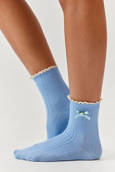 So sweet crew socks in a soft pointelle knit. Trimmed with a little bit of lace along the ankle and finished with a rosette accent. Content + Care 95% Polyester, 5% elastane Hand wash Imported Size + Fit Crew length | Rosette Pointelle Crew Sock in Blue, Women's at Urban Outfitters Spring Socks, Cute Ankle Socks, Girly Socks, Coquette Socks, Urban Outfitters Winter, Frill Socks, Aesthetic Socks, Pretty Socks, Blue Socks