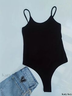 Katykey - Sleek Spaghetti Strap Bodysuit with Backless Design, Ideal for Summer Fashion - Womens Apparel Trendy Stretch Bodysuit With Spaghetti Straps, Casual Black Bodysuit With Spaghetti Straps, Trendy Seamless Bodysuit With Spaghetti Straps, Solid Cami Bodysuit With Lined Body, Solid Color Cami Bodysuit With Lined Body, Stretch Bodysuit With Spaghetti Straps, Casual One-piece Bodysuit With Built-in Bra, Stretch Tank Top With Spaghetti Straps And Lined Body, Basic Black Bodysuit For Summer