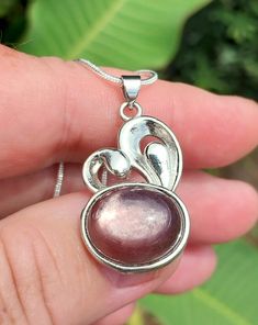 Gorgeous Purple Mica Bunny S925 Pendant and Necklace! Beautiful Purple/Pink, bright in color. With so much flash and sparkle its really gorgeous.   Definitely one of my favorite Jewelry pieces. Pendant is shaped like a Bunny head. Super cute design.  This stone is oval in shape, inlay setting with bail style connection. 100% Silver setting.  Comes with a Snake style chain with Lobster Clasp.  Size: 18 inch Box Chain Pick up this one of a kind Crystal Pendant Necklace today! I have other Necklace styles and sizes in this piece available on my page under the section "Jewelry" stop by and check them out! FREE GIFTS WITH EVERY PURCHASE! 🎁 Pink Oval Sterling Silver Necklace, Pink Sterling Silver Oval Pendant Jewelry, Pink Sterling Silver Jewelry With Oval Pendant, Pink Cabochon Jewelry For Anniversary, Pink Cabochon Necklaces For Gift, Pink Cabochon Necklaces For Jewelry Making, Handmade Pink Oval Pendant Jewelry, Pink Handmade Necklaces For Anniversary, Pink Sterling Silver Necklace Gift