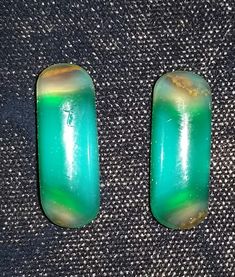 This Chromium Chalcedony is very high grade. This type of Chrysoprase is from Africa. I just couldn't get very good pictures. The stones are so much nicer in person!  This was one stone that I cut in half to make a matching pare. It actually had angle wing in it. Like banded agate. That's uncommon for this type of Chalcedony!   The last picture is the back of the stone.  All my stones are polished front and back.     One stone measures 20.20mm  by 7.52mm and 5.50mm thick. The other, 20.95mm by 7.86mm and 5.52mm thick. The stones together weigh 14.135cts. I'm asking $50ct.  I think its worth $75 to $100 per ct. Unique Green Gemstones For Formal Occasions, Good Pictures, Banded Agate, High Grade, Cool Pictures, Things To Think About, Agate, Craft Supplies, Etsy Uk