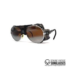 Details:-Color: Black frame with grey leather finishings / Brown double mirrored "Cebe 2000" lens-Size: Large / Frame width 136 mm / Frame height 53 mm / Temple length Variable-Made in France-Product-No. Cebe 395 "Walter Checchinel"-Includes the original Cebe leather side flaps and Cebe hardcase, set is completeInfo/description:-incredibly rare vintage Cebe sunglasses from the 90's-sturdy frame by famous Cebe (first class quality)-engineered by the french alpinist Sr. Walter Checchinel-impact re Vintage Aviator Sunglasses With Tinted Lenses For Outdoor, Vintage Aviator Sunglasses With Uv Protection For Outdoor, Retro Wayfarer Sunglasses For Streetwear, Vintage Polarized Sunglasses For Streetwear, Vintage Aviator Sunglasses For Summer Outdoor, Vintage Mirrored Sunglasses For Streetwear, Vintage Aviator Sunglasses With Anti-reflective Coating For Outdoor, Vintage Aviator Sunglasses For Outdoor With Anti-reflective Coating, Retro Mirrored Sunglasses For Streetwear