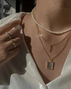 A classy and minimal necklace to wear every day. Its simplicity and featherlight weight compliments any outfit, occasion, and lifestyle. Featuring a tiny CZ bar charm suspended from a curb chain necklace. …………………………………. D E T A I L S • CZ charm measures 2 mm x 13 mm • Tarnish-resistant, waterproof, safe for sensitive skin • Curb chain with spring clasp• 18K Gold Filled • Hypoallergenic (lead-free, nickel-free, cadmium-free) Chic Adjustable Pearl Necklace, Chic White Choker Jewelry, Chic White Chain Necklace For Everyday, Chic Everyday Chain Necklace With Pearl Charm, Minimalist White Choker Chain Necklace, Minimalist White Chain Choker Necklace, White Minimalist Layered Necklace With Adjustable Chain, Elegant White Choker For Everyday Wear, Chic White Layered Necklace