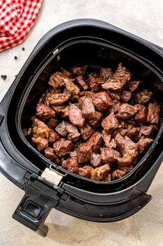 the meat is cooked and ready to be put in the slow cooker for cooking