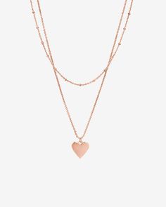 This layered necklace features a dainty shorty chain with a longer chain that has Heart Pendant. Materials: 14K yellow, rose or white gold plated Trendy Rose Gold Heart Necklace, Minimalist Rose Gold Layered Necklace With Adjustable Chain, Rose Gold Heart-shaped Chain Necklace, Minimalist Rose Gold Necklace With Double Chain, Dainty Rose Gold Chain Necklace For Layering, Minimalist Rose Gold Layered Necklace With Delicate Chain, Everyday Double Chain Rose Gold Jewelry, Minimalist Rose Gold Double Chain Necklace, Trendy Rose Gold Delicate Chain Necklace