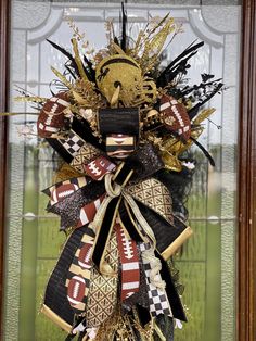 a football themed wreath on the front door