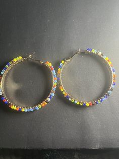 Gold multi colored seed bead hoop earrings Multicolor Tiny Beads Hoop Earrings, Cheap Multicolor Beaded Hoop Earrings, Multicolor Small Hoop Jewelry With Colorful Beads, Multicolor Beaded Small Hoop Earrings, Unique Multicolor Beaded Hoop Earrings, Beaded Hoop Earrings, Beaded Hoops, Jewelry Earrings Hoops, Seed Beads