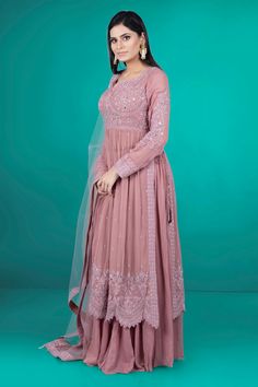 Introducing our elegant Partywear Suit D-116! Featuring a comfortable plazzo and exquisite mirror and thread work, this suit is the perfect choice for any special occasion. Enjoy the blend of traditional and modern designs in this expertly crafted piece. Elevate your style with our Partywear Suit D-116. Pink Palazzo Set With Dori Work For Wedding, Diwali Floor-length Palazzo Set With Mirror Work, Floor-length Salwar Kameez With Dori Work For Eid, Designer Floor-length Salwar Kameez With Dori Work, Georgette Palazzo Set With Dori Work For Eid, Semi-stitched Floor-length Sharara With Mirror Work, Floor-length Palazzo Set With Dabka Work For Diwali, Elegant Chikankari Embroidery Anarkali Set, Maxi Length, Festive Floor-length Palazzo Set With Dori Work