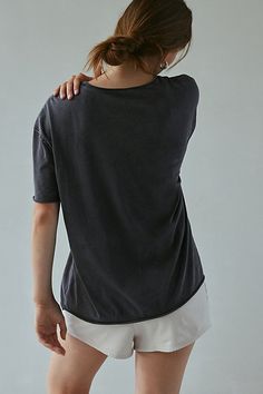 Better-than-basic Out From Under tee in a slouchy, oversized fit. Designed with a crew neckline, drop shoulders and short sleeves with raw, rolled edges for a relaxed finish. Only at Urban Outfitters. Features Out From Under Taylor oversized crew neck tee Oversized t-shirt Soft and stretchy knit Crew neckline with drop shoulders and short sleeves with raw, rolled edges Raw, rolled hemline Relaxed, oversized fit Regular length UO exclusive Content + Care 100% Cotton Machine wash Imported Size + F Effortless Short Sleeve T-shirt For Loungewear, Effortless Summer T-shirt For Casual Gatherings, Effortless Short Sleeve Summer T-shirt, Black Relaxed Fit T-shirt, Washed Crew Neck T-shirt For Layering, Relaxed Scoop Neck Summer Tops, Boxy Fit Washed Cotton Top, Boxy Fit Cotton Washed Top, Basic Short Sleeve Top With Shirttail Hem For Everyday