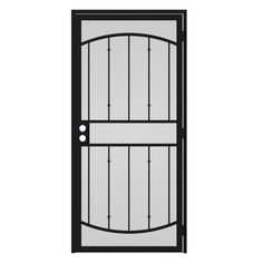 an iron door with glass panels on the top and bottom panel, in black finish