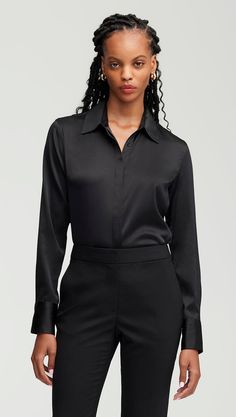 Made of a stretchy silk satin, this slim fit blouse is sure to become a daily favorite. The lightweight, airy silhouette allows for comfortable movement and natural stretch. Easy to tuck and style with your favorite pair of trousers or skirt. Elegant Viscose Blouse For Night Out, Elegant Silk Tops For Business Casual, Sleek Satin Tops For Workwear, Classic Silk Top For Night Out, Sleek Solid Silk Blouse, Elegant Satin Blouse For Workwear, Elegant Silk Tops For Office Wear, Timeless Silk Tops For Office, Versatile Viscose Blouse For Evening