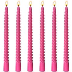 six pink candles lined up in a row