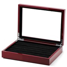 an open wooden watch box on a white background