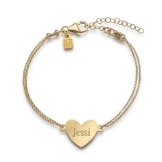 Introducing our stunning gold-colored bracelet for women that is sure to steal hearts everywhere! This exquisite piece combines elegance and sentiment in the most beautiful way. Adorned with a smooth heart pendant, which can be engraved with a personal message, this bracelet becomes more than just a piece of jewelry; it becomes a cherished keepsake. Whether it's a special date, a meaningful quote, or a loved one's name, the possibilities for engraving are endless, allowing you to create a truly Adjustable Heart Charm Chain Bracelet For Wedding, Adjustable Wedding Chain Bracelet With Heart Charm, Personalized Gold Name Bracelet As Bridesmaid Gift, Personalized Gold Chain Bracelet For Valentine's Day, Gold Charm Bracelet With Heart Charm For Mother's Day, Heart Charm Bracelet For Personalized Gift, Gold Bracelets For Bridesmaid Gift On Valentine's Day, Gold Bracelets For Bridesmaids, Valentine's Day Gift, Gold Bracelets For Bridesmaid Gift