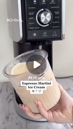 someone is holding an ice cream container in front of the coffee maker and it's instructions on how to make espresso martini