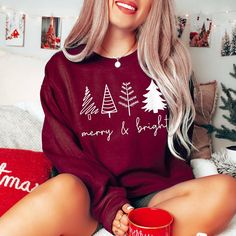 Celebrate the Season in Style with our Christmas Print Sweatshirt! Perfect for cozy holiday gatherings or a heartwarming gift, it’s the festive flair you need. Limited Edition – Grab yours before it’s gone! Halloween Drinks, Cozy Holiday, Christmas Print, Print Sweatshirt, Swimwear Cover, Holiday Gathering, Christmas Prints, Hoodie Top, Printed Sweatshirts