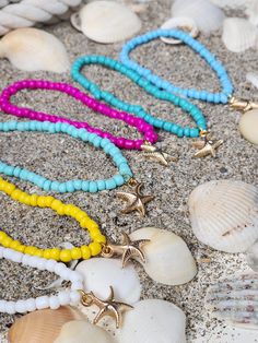 Cute Beachy, summer ready, charm bracelet to spruce up your style this summer. Handcrafted with love using seed beads and elastic cords. Pairs well with other stackable bracelets. Beach Season Tiny Beads Bracelets, Summer Strand Beaded Bracelets With Starfish Charm, Colorful Beaded Starfish Bracelets For Beach, Colorful Beads Starfish Bracelet For Beach, Colorful Starfish Beaded Bracelets For Beach, Starfish Shaped Beaded Bracelets For Beach, Summer Beaded Strand Bracelets With Starfish Charm, Summer Beach Bracelets With Tiny Beads, Tiny Beads Bracelets For Summer Beach