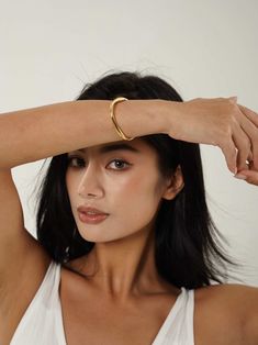 Discover the modern artistry of our Abstract Open Cuff Bracelet. Featuring a unique, flowing design, this bracelet blends contemporary style with effortless elegance. Chic Everyday Bangle With Bracelet Strap, Trendy Cuff Bracelet With Strap, Trendy Cuff Bracelet Jewelry, Trendy Everyday Cuff Bangle Bracelet, Adjustable Contemporary Cuff Bracelet, Elegant Adjustable Cuff Bracelet With Jubilee Design, Adjustable Bracelet With A Modern Twist, Modern Everyday Cuff Bracelets, Modern Cuff Bracelets For Everyday Wear