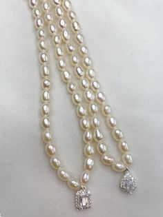 Material: genuine freshwater pearl,S925 sterling silver with Rhodium plated connector, alloy with gold plated pendant Luster: high Pearl size:4-5 Blemish: few blemish Length: 42cm (16.5 inches) The silver necklace in the picture: https://www.etsy.com/listing/1038541031/solid-sterling-silver-necklace-925?ref=shop_home_active_1&pro=1&frs=1 DISCOUNTS ON LARGE ORDERS Get 10% off for order $50-$99 Get 15% off for order $99-$199 Get 20% off for order $200-$399 Get 25%off for order $400 and mor White Gold Teardrop Pearl Necklace With Charm, Silver Pearl Drop Necklace In Choker Style, Teardrop Pearl Charm Necklace For Anniversary, Sterling Silver Pearl Drop Necklace Pear Shape, White Gold Pearl Charm Necklace, Classic Pearl Charm Necklace With Pearl Pendant, Classic Pearl Necklace With Teardrop Pendant And Pearl Charm, Classic Pearl Charm Necklaces With Pearl Drop, Pear Shaped Pearl Charm Necklace For Anniversary