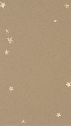 a brown background with gold stars on it