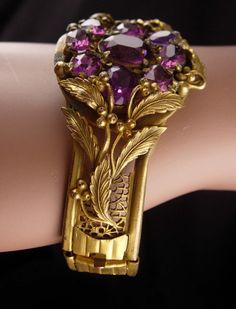 If you love Purple rhinestones in old jewelry then you will love these two pieces. The bracelet has such rich patina and color that it only enhances the rich deep colors and the brooch is a nice match for it. The bracelet has a slide closure which works great. Be sure to look at all the photos for more sizes and condition. Sold as found. 2-2-20 Vintage Jeweled Bracelets For Collectible, Antique Bracelet For Evening Wear, Victorian Hand Set Jewelry For Formal Occasions, Vintage Jeweled Round Jewelry, Victorian Jewelry Bracelet With Jewels, Victorian Jeweled Wedding Bracelets, Vintage Hand Set Bracelets For Formal Occasions, Vintage Bangle Jewelry For Formal Occasions, Vintage Formal Bangle Hand Set