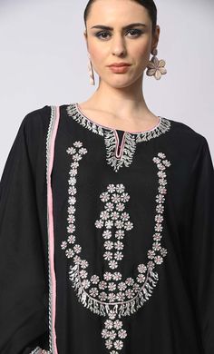 Introducing our enchanting 3-piece Salwar Kameez with Dupatta set, where traditional craftsmanship meets contemporary style. This set features stunning machine embroidery adorned with delicate sequins work, adding a touch of glamour and sophistication to your ensemble. Each piece is meticulously crafted to perfection, ensuring that every stitch and detail exudes elegance and charm. Whether you're attending a festive celebration or a formal event, this Salwar Kameez set promises to elevate your look with its timeless appeal and exquisite craftsmanship. Experience the epitome of luxury and grace with our 3-piece Salwar Kameez set, designed to make you shine on every occasion. Size & Fit Model height is 5’9’ and is wearing a Small sizeMaterial & CareMaterial: Rayon Care: Gentle machine wash i Festival Palazzo Set With Embroidered Border And Traditional Drape, Designer Embroidered Palazzo Set For Navratri, Designer Palazzo Set With Embroidered Border, Designer Sharara With Straight Kurta And Embroidered Border, Traditional Drape Palazzo Set With Embroidered Border For Navratri, Navratri Embroidered Palazzo Set In Traditional Drape, Navratri Traditional Drape Palazzo Set With Embroidered Border, Festive Designer Palazzo Set With Embroidered Border, Navratri Palazzo Set With Embroidered Border And Straight Kurta