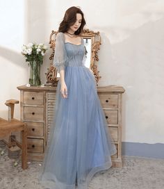 Prom Dress Cute Simple, Pale Blue Tulle Dress, Flowy Blue Dress Long, Longsleeve Fairy Dress, Light Blue Prom Dress Long Sleeve, Pale Blue Ball Gown, Half Sleeve Prom Dress, Blue Fairy Dress Aesthetic, Fairy Light Dress