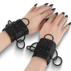 Faux Leather Spike Wrist Cuffs Bracelets. Comes In A Pair. Featuring A Center Studded Metal Plate. Large D And O Rings. Flat Round Studded Details. Adjustable Buckle Closure. Styles: Gothic Punk Festival Goth Aries Bracelet, Spiked Jewelry, Leather Wrist Cuff, Alternative Shoes, Spike Bracelet, Festival Shoes, Brighton Bracelets, Wrist Accessories, Shoe Inserts