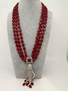 AD Red Stone Pendent Red Monalisa Beads Mala Necklace Length : 24 Inches No Earrings Red Crystal Dangle Jewelry, Red Dangle Necklaces For Party, Red Coral Pendant Necklace, Red Beaded Pendant Necklace, Red Long Necklace For Party, Red Necklaces With Polished Oval Beads, Red Beaded Dangle Necklace, Party Necklace With Polished Oval Beads, Party Necklaces With Polished Oval Beads