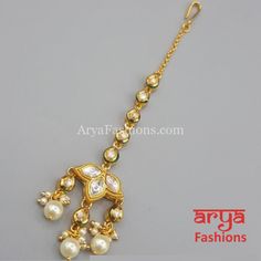 Russhi Small Kundan Pearl Mang Tika for Girls Bollywood Style Adjustable Tikka For Festivals, Adjustable Gold Kundan Necklace With Latkans, Gold Tikka With Tilla As Gift, Gold Tikka With Stone Work For Festive, Gold Hand Set Tikka For Festivals, Hand-set Gold Tikka For Festivals, Gold Tikka With Stone Work For Festive Occasions, Gold Tikka With Stone Work For Festive Season, Festival Gold Hand Set Tikka