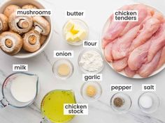 ingredients to make chicken broth laid out on a white marble counter top, including mushrooms, butter, flour, and other ingredients