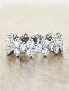 an image of a diamond ring on a table