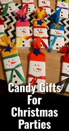 candy gifts for christmas party with snowmen on them and ribbons in the shape of presents