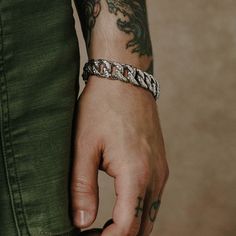 This substantial chainlink bracelet features a heavy-duty hammered texture that's just as rough around the edges as you are. Water Bracelet, Everyday Bracelet, Light Well, Mens Bracelet Silver, Men's Bracelet, Neck Chain, Sterling Silver Mens, Silver Pieces, Chain Link