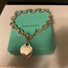 Never Worn Yet 9 Inch Size Large Tiffany And Co Authentic Bracelet Heart Charm Is Engrave-Able I Have The Return To Tiffany One So Haven’t Worn This Does Not Come With Box Or Card Or Tissue Just The Beautiful Bracelet Luxury White Gold Heart Bracelet, Luxury Silver Heart Cut Bracelet, Elegant Formal Bracelet With Heart Charm, Elegant Formal Bracelets With Heart Charm, Elegant Formal Heart Bracelet With Heart Charm, Elegant Formal Heart Bracelet With Charm, Classic Formal Bracelet With Heart Charm, Classic Bracelets With Heart Charm, Luxury Silver Heart Bracelet For Valentine's Day