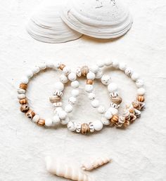 Such a beautiful neutral beach stack! All three are made with white turquoise stones, African bone beads and mini seashells for a fun beachy boho vibe. Each bracelet is sold separately. Use the drop down bar to select one, two or all three  bracelets. Thank you for looking!  PLEASE NOTE, I need your wrist size not your bracelet size.  How to measure your wrist:  take a piece of string or ribbon (not any other cord) wrap it around the largest part of your wrist then lay it on a ruler or tape measure and that's your wrist size. Turquoise Bracelets, Beach Bracelet, Howlite Bracelet, Cord Wrap, Beachy Boho, Beach Bracelets, Chic Bracelet, Boho Bracelet, Bone Beads