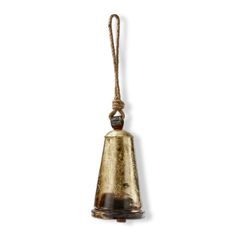 a bell hanging from a rope on a white wall