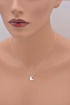 This lovely necklace makes a beautiful, lasting gift. I make this using 925 sterling silver chain and spring clasp. The crescent moon charm is a metal alloy with shiny silver finish and measures approximately 1/2 inch tall. It moves freely along the chain. Comes in a gift box, perfect for gift-giving. This piece looks great when paired with a star necklace. See 5th photo for both necklaces together. Listing is for moon necklace only but star necklace can be purchased here:www.etsy.com/listing/24 Silver Moon Necklace, Moon Necklace Silver, Long Drop Earrings, Silver Moon, Moon Charm, Lovely Necklace, 925 Sterling Silver Chain, Moon Necklace, Minimalist Necklace