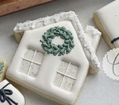 decorated cookies with frosting and icing on a table