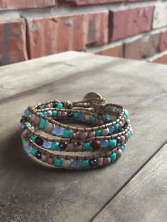 Wrap bracelet that goes around the arm three times. Artistic jewelry with a hobo style. U will love it and it's a great gift! Adjustable Hand-strung Cuff Bracelet Gift, Turquoise Multi-strand Wrap Bracelet As Gift, Bohemian Cuff Bracelet With Hand Wrapped Round Beads, Adjustable Hand-strung Wrap Bangle, Bohemian Hand Wrapped Cuff Bracelet With Round Beads, Bohemian Hand-wrapped Round Bead Cuff Bracelet, Nickel Free Bohemian Bracelets, Adjustable Artisan Hand Wrapped Bracelets, Nickel-free Bohemian Bracelets