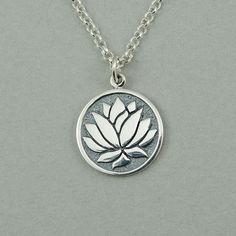 "Sterling silver Lotus Flower necklace on a sterling silver chain. The lotus pendant measures 5/8\" tall. All jewelry parts are 925 solid sterling silver. Send jewelry gifts direct with free gift box and note. Available in 16\", 18\" (model shown) & 20\" Gift Box Included Short gift note may be added at checkout. Receipts not included. For multiple orders needing separate gift boxes, mark as gifts or only 1 gift box will be included. Add A Gemstone https://www.etsy.com/listing/210720273 Abou Sea Turtle Jewelry, Buddhist Necklace, Buddhist Jewellery, Lotus Flower Necklace, Popular Necklaces, Lotus Jewelry, Silver Flower Necklace, Lotus Necklace, Turtle Jewelry