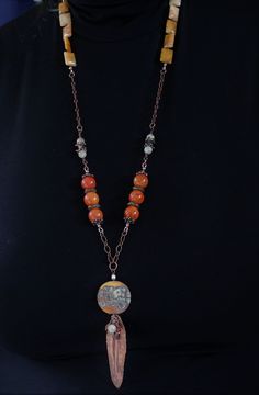 "A lovely combination of agate and quartz gemstones, antique copper chain, handmade copper components and clasp, and accented with my handmade lampwork glass beads, wire wrapped with a hand formed folded copper leaf, made by moi, and little gemstones. This super long, one of a kind lampwork necklace measures 33\" with a 5\" pendant and will arrive beautifully packaged. Sure to garner lots of compliments! To view more jewelry and handmade beads, click here... https://www.etsy.com/shop/StoneDesign Bohemian Wire Wrapped Czech Glass Beaded Necklace, Bohemian Wire Wrapped Beaded Necklaces With Czech Glass, Bohemian Czech Glass Beaded Necklace With Wire Wrap, Bohemian Czech Glass Wire Wrapped Beaded Necklace, Artisan Wire Wrapped Czech Glass Necklaces, Artisan Czech Glass Wire Wrapped Necklaces, Artisan Wire Wrapped Czech Glass Necklace, Bohemian Agate Beaded Chain Necklace, Bohemian Beaded Chain Copper Necklaces