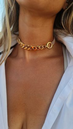 "♦ A beautiful Gold chain choker made of Gold-plated brass in very high quality with two O rings on the sides. The necklace is suitable for those who love street fashion, and it is suitable for morning and evening. You can also purchase the necklace in sterling silver. (see photos) ▪ SIZE Length: 11.8\" (30cm) up to 17.7\"(45cm) Width chain:0.51\" (1.3 cm) Wide hoop: 0.78(2cm) You can see another model of a choker in the next link: https://etsy.me/2OoCzSq ♦ This piece of jewelry is perfect as a Chunky Gold Choker Necklace, Thick Necklace Chain, How To Wear A Choker Necklace Outfit, Cloth Choker Necklace, Edgy Jewelry Gold, Gold Chain Choker Necklace, Necklace Outfit Ideas, Choker Styling, Gold Choker Designs