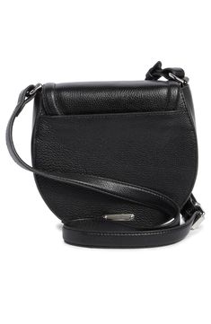 Smooth leather defines this chic and compact saddle bag fashioned with a front snap-flap closure and gleaming silvertone hardware. Snap-flap closure Top crossbody strap Interior slip pocket Lined Leather Imported Black Saddle Shoulder Bag With Palladium Hardware, Black Flap Saddle Bag For Formal Occasions, Black Formal Flap Saddle Bag, Evening Black Saddle Bag With Palladium Hardware, Evening Saddle Shoulder Bag With Silver-tone Hardware, Classic Crossbody Saddle Bag With Silver-tone Hardware, Classic Saddle Crossbody Bag With Silver-tone Hardware, Black Saddle Bag With Magnetic Closure For Formal Occasions, Black Formal Saddle Bag With Magnetic Closure