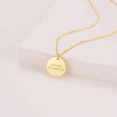 🎇Write your memorable quote down and wear it in front of your heart and match it with the type of chain you love! Quotes, dates, coordinates, Roman Numberals ,and Names are the perfect content to be personalized on this dainty little coin pendant With the Personalized quote coin necklace beautifully packaged in a gift box, 🎁 it also makes it a thoughtful and memorable gift for loved ones on special occasions such as Valentine's day, Christmas, Mother's Day, or Thanksgiving.  💍The necklace is Gold Nameplate Necklace With Engraving Option, Engraved Yellow Gold Medallion Charm Necklaces, Classic Pendant Necklace With Etched Details, Classic Etched Pendant Necklace, Classic Engraved Name Necklace Pendant, Classic Engraved Pendant Name Necklace, Classic Engraved Name Pendant Necklace, Elegant Nameplate Necklace With Laser Engraving, Sterling Silver Pendant Name Necklace With Engraving