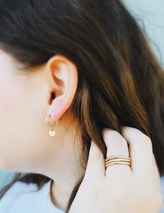 Adorn you hands with this timeless Minimal Initial Signet Ring. Hand-crafted from 14K yellow gold filled, this ultra-chic ring is a perfect gift for moms or couples. It's a unique, minimal piece with the power to carry a special, sentimental message. Rings are handmade in our Indiana studio. There will be a small color difference in the gold where it is soldered together in our studio. Please add initial in the NOTES box at checkout. Gold Stackable Earrings For Gift, Minimalist Hoop Jewelry As Gift, Minimalist Hoop Jewelry Gift, Gold Huggie Jewelry With Simple Design, Gold Simple Design Huggie Jewelry, Gold Plated Hoop Rings For Everyday, Minimalist Small Hoop Yellow Gold Jewelry, Minimalist Small Hoop Jewelry In Yellow Gold, 14k Gold Huggie Earrings Gift