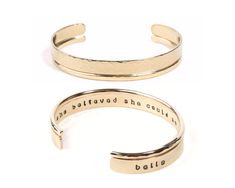 Embrace the timeless elegance of our She Believed She Could So She Did Fine Metal Bracelet Set, meticulously handcrafted to inspire and empower. Handmade with the utmost care and dedication, each piece is a testament to artisanal excellence and the unwavering spirit of achievement. Immerse yourself in the beauty of 14 karat yellow gold filled, where the iconic expression "she believed she could so she did" is precisely hand cast on the inside of the gold slim cuff, serving as a constant reminder Elegant Stamped Cuff Bracelet, Elegant Stamped Bracelet, Elegant Round Stamped Bracelets, Elegant Stamped Bangle Bracelet, Elegant Stamped Bangle Perfect For Gifts, Elegant Stamped Bangle For Gift, Elegant Stamped Bangle As Gift, Elegant Stamped Bangle Jewelry, Elegant Stamped Gold Bracelets